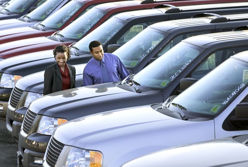 Couple buying SUV