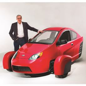 Paul Elio, founder and CEO of Elio Motors, with the P5 prototype of the Elio, a three-wheeled vehicle that will get up to 84 MPG