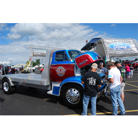 Behind the Vintage Works truck can be seen the Ford Motors Co. booth at the Iola Car Show