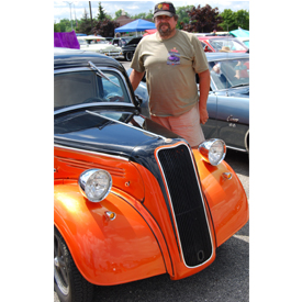 Terry Olson, owner of Anglia Brokers, which specializes in Anglia builds and parts, among other bespoked rides