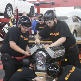 A team works feverishly at a Hot Rodders of Tomorrow event during the past weekend