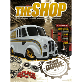 The cover of THE SHOP magazine's August issue, featuring art work by Murray Pfaff of Pfaff designs