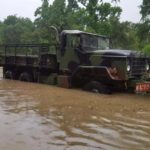 Another 5-ton military vehicle aiding in the rescue efforts near Houston