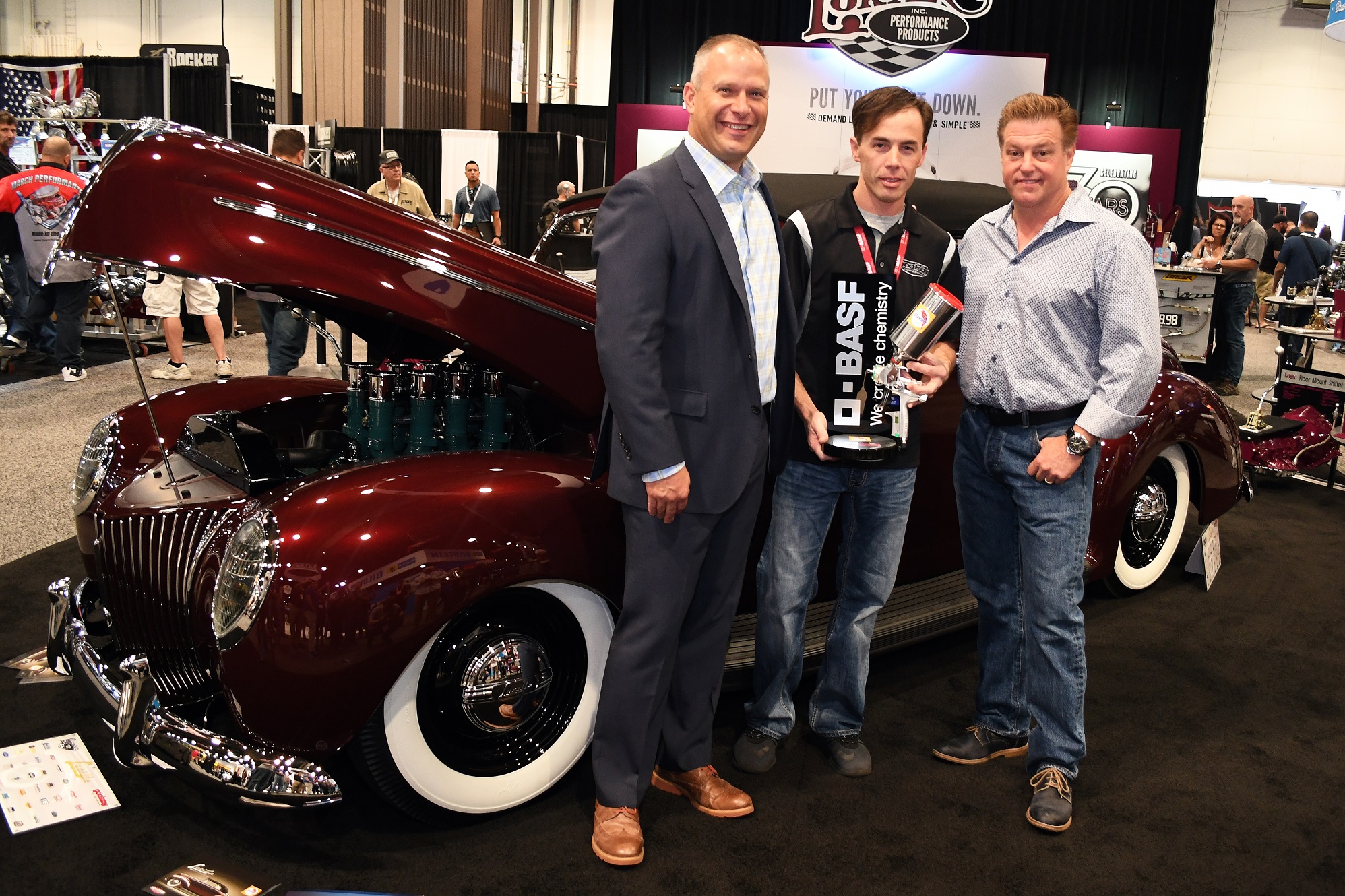 Jonathan Goolsby of Goolsby Customs won the Glasurit Best Paint Award at the 2017 SEMA Show. Goolsby is pictured with BASF North