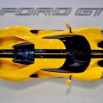 Yes, a bright yellow new Ford GT just hanging on the wall, something every Ford dealership worldwide should have in their showro