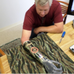 A prosthetic arm was wrapped in Avery Dennison MPI 1105 in a camouflage print by Stephen Boyer of Laser Wraps.