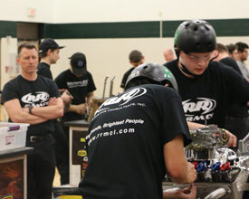 Team R&R Marketing from York County School of Technology races the clock during Hot Rodders of Tomorrow competition as instructo