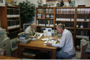 Researchers working at the Horseless Carriage Foundation Inc. Automotive Research Library in La Mesa, California