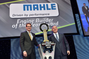 Doug Yates (left), of Roush Yates Engines accepts the MAHLE Engine Builder of the Year Award for the Monster Energy NASCAR Cup S
