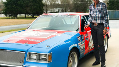 "The King" Richard Petty stands next to the replica of his storied 1981 Buick Regal