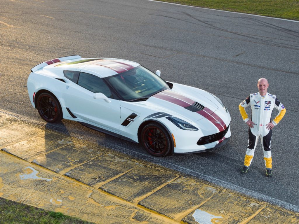 Jan Magnussen Edition:Â Arctic White exterior with Crystal Red stripes and gray hash marks, body-color mirrors, black wheels with