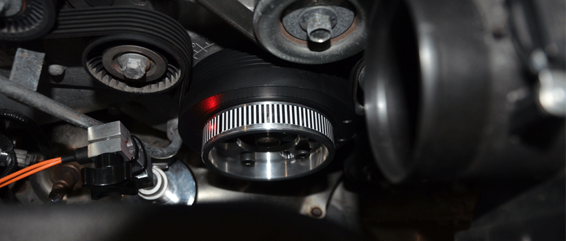 Tight engine bay space of Scion FR-S. Torsional vibration analysis testing under way.