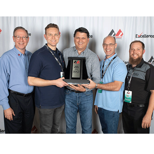 The Earl Owen Co. team joins with The AAM Group team for a quick snapshot after winning the 2019 Member of the Year award at the