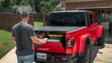 The Armis Hard Folding Bed Cover for Jeep Gladiator features a tri-fold design and LINE-X coating.
