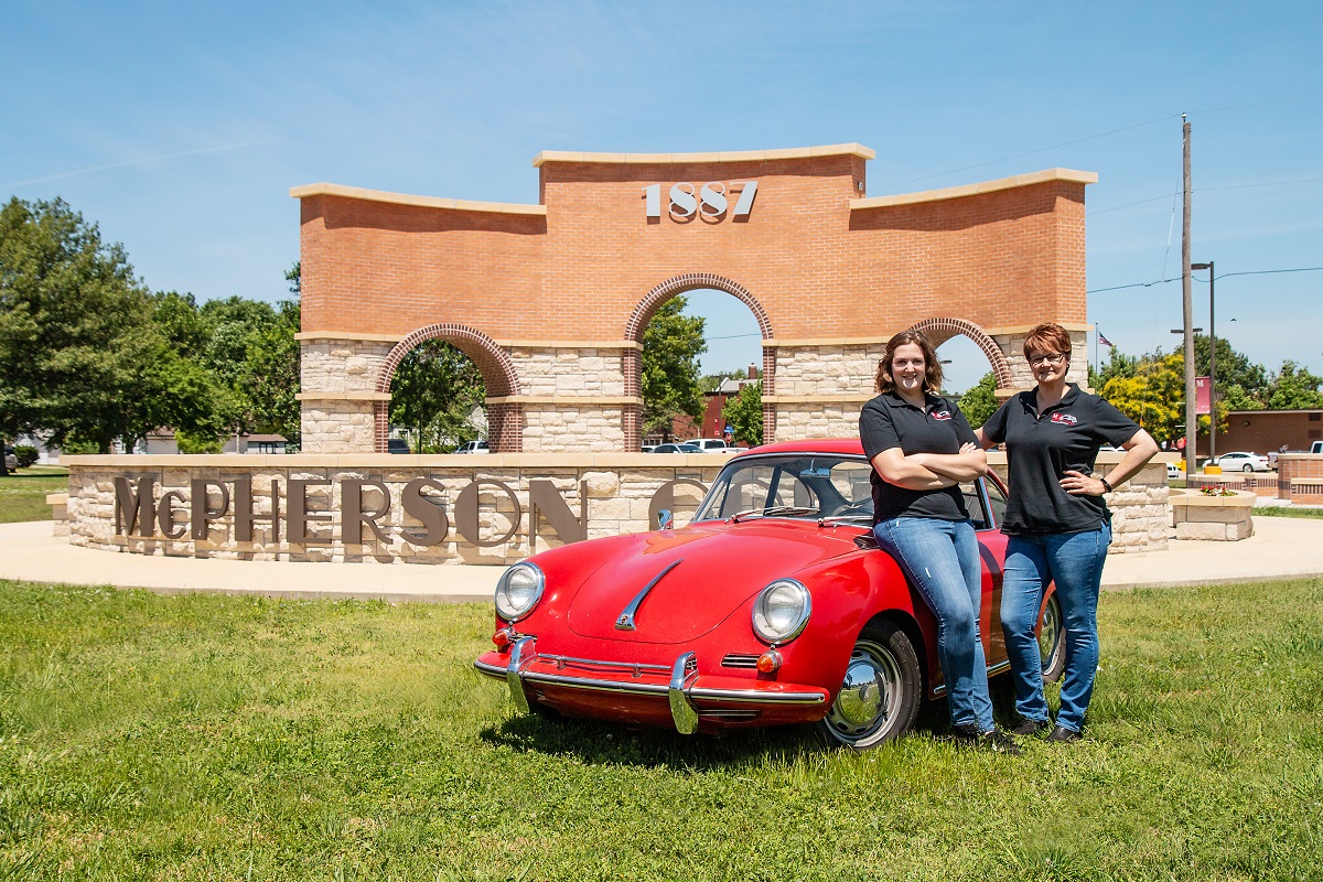 Abigayle Morgon, left, and Amanda Guiterrez, right, will lean on this 1965 Porsche during the July 14-19 SCM1000 tour. The pair