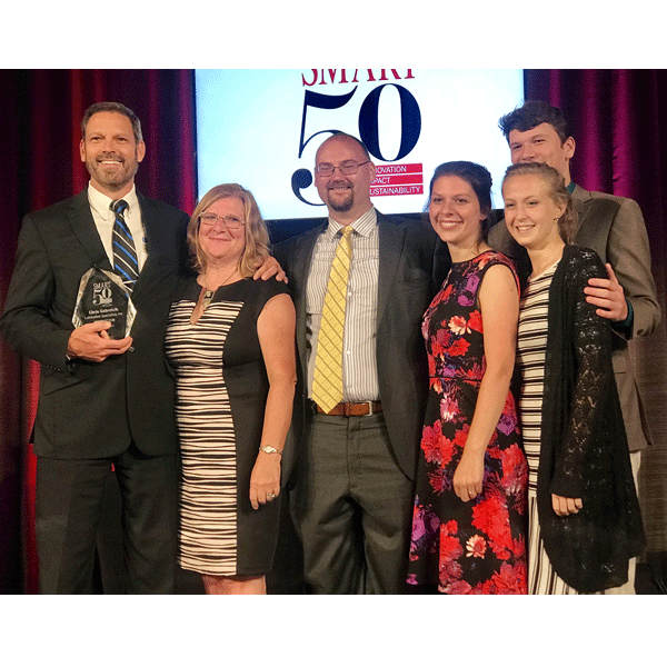 LSI President and Founder Chris Gabrelcik accepts the Smart 50 Award for Innovation sponsored by Smart Business Magazine with me