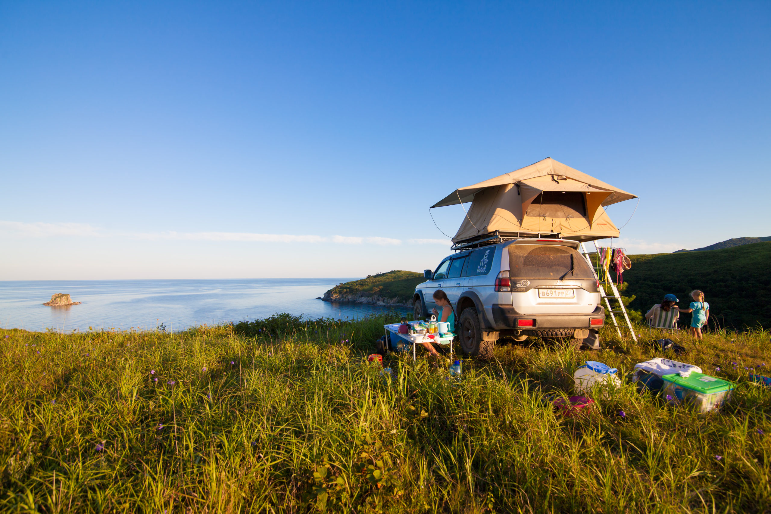 VITYAZ, RUSSIA - AUGUST 08, 2016: Mitsubishi Pajero Sport with rooftop tent. Camping life