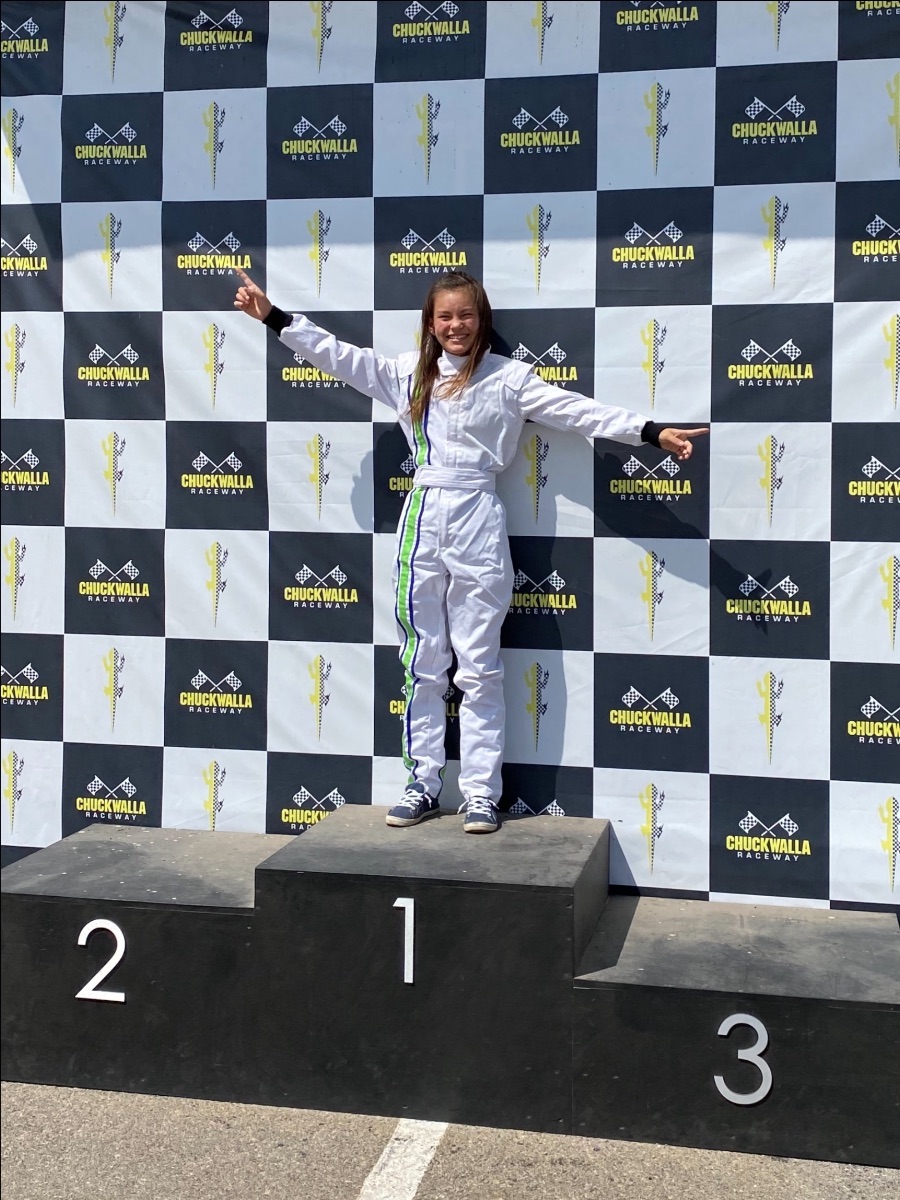 girl racing STEM podium