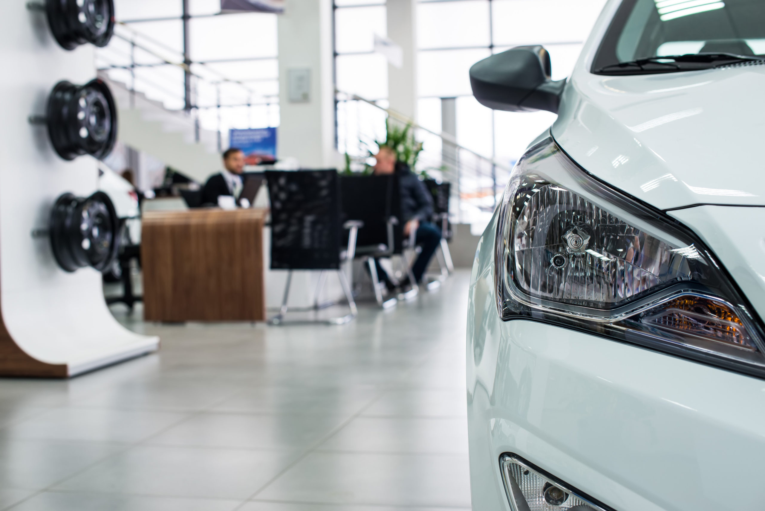 Stock of cars in showroom of automobile dealer