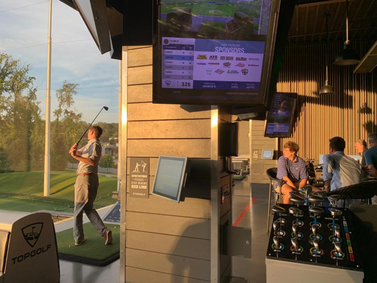 YANG Top Golf Event Raises $15,000 for AACF | THE SHOP