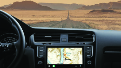 car navigating down desert road