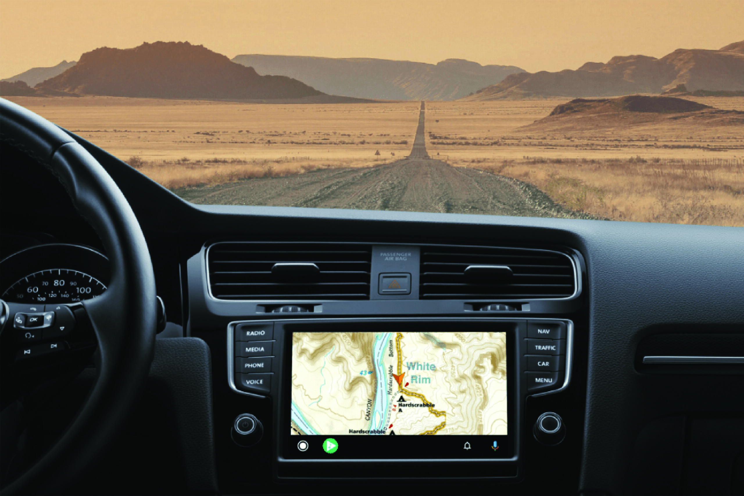 car navigating down desert road