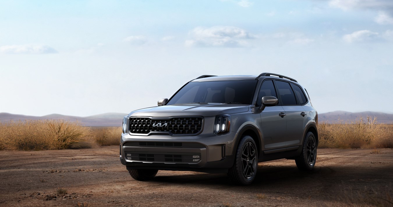 suv driving along dirt road