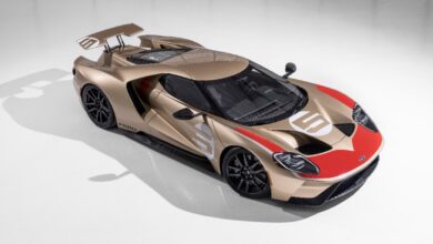 gold and red Ford gt race car