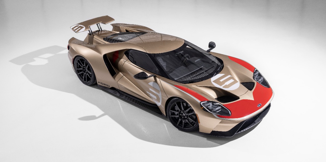 gold and red Ford gt race car