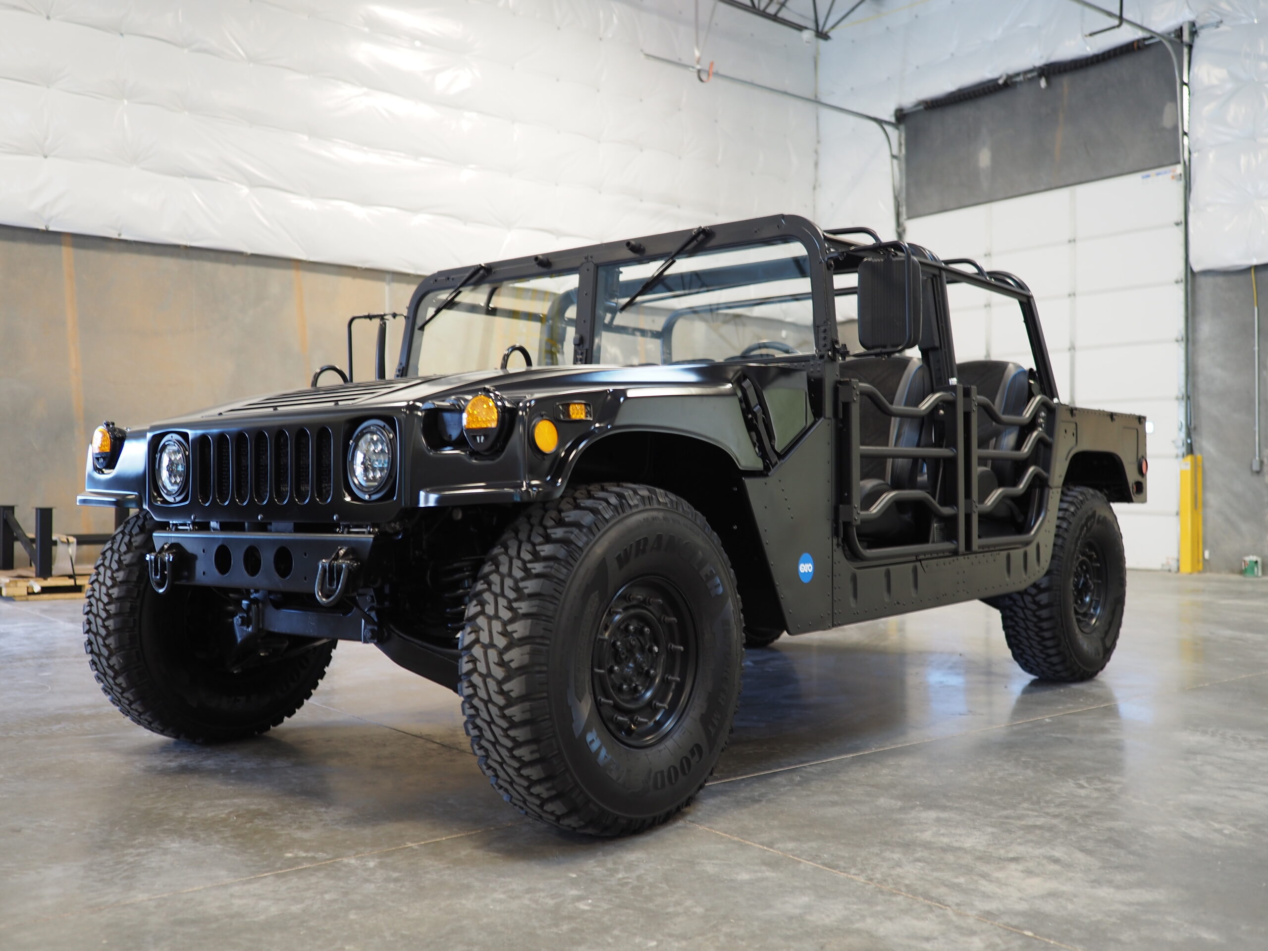 Humvee electric outlet conversion