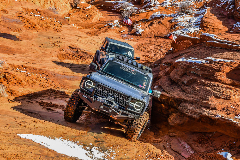 Blue Westin Bronco on the rocks