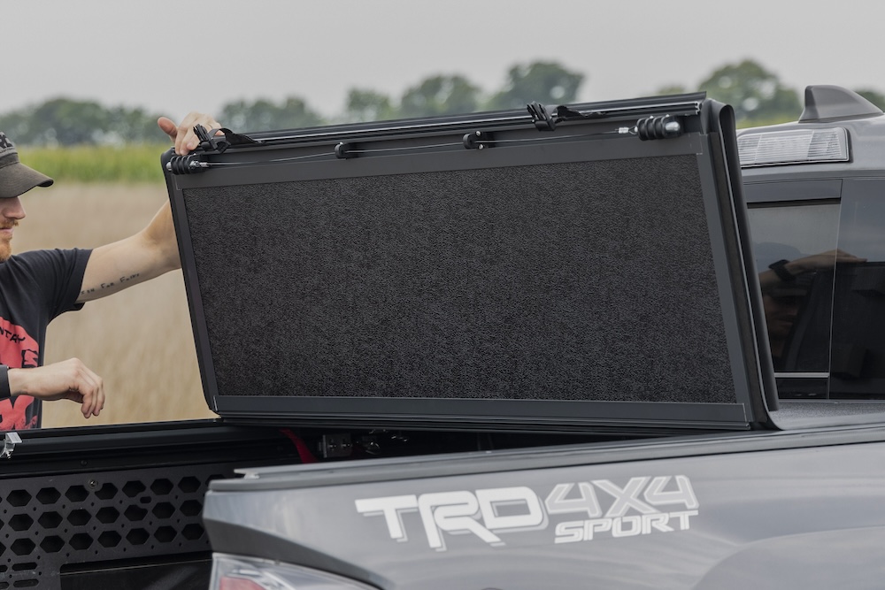 Rough Country tonneau panel open on silver Toyota