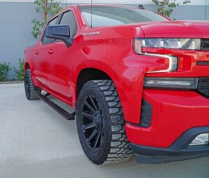 Steelcraft PowerGlide running board on red truck