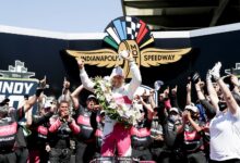 Hélio Castroneves celebrates winning the Indy 500