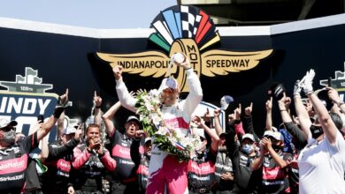 Hélio Castroneves celebrates winning the Indy 500