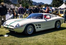 Car on display outside at The Quail