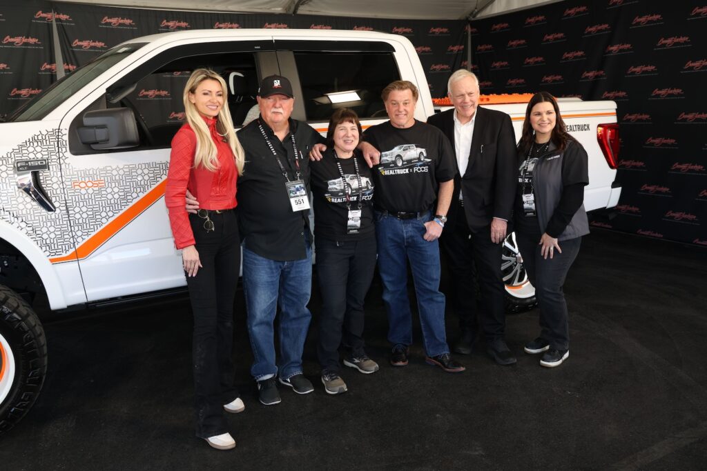 RealTruck Team and Chip Foose in front of F-150 at Barrett-Jackson auction