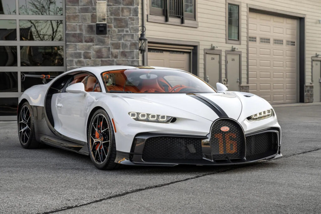 White 2022 Bugatti Chiron Pur Sport parked in front of house