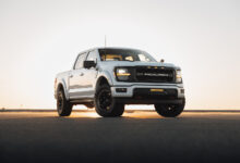 Roush Performance Ford F-150 parked in front of setting sun