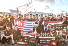 Buckeyes Formula Student Team posing with car