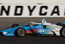 PPG logo on No 2 Team Penske Chevrolet racing on track