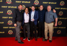 Tint World Stage with franchise owners accepting award