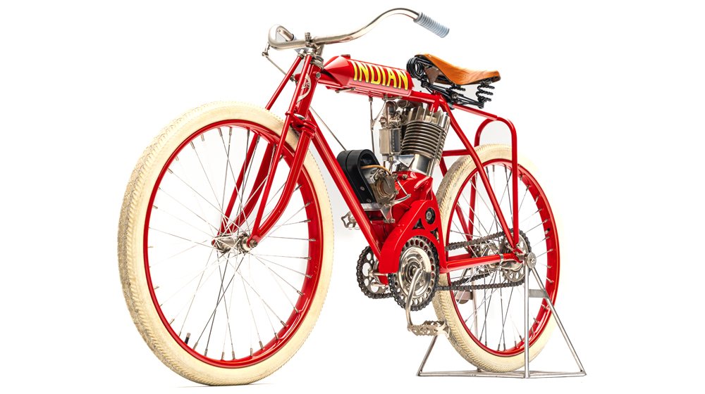 Early Indian motorcycle on white background