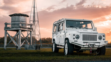 ECD Auto Design Project Blanca parked in front of old water tower and windmill