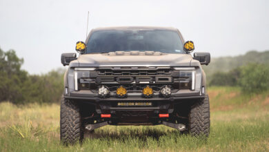 Front of Ford truck parked in grass Horsepower Automotive Group