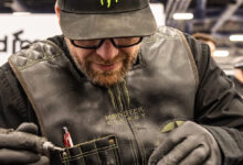 Hank Robinson, renowned engraver, at work