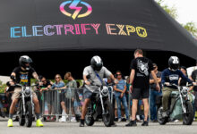 Lineup of e-bikes with riders at Electrify Expo Orlando 2024