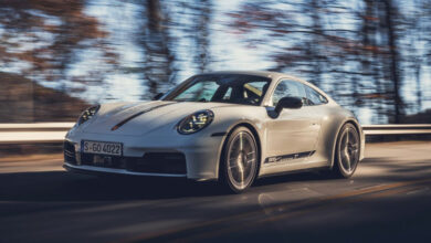 Porsche 911 driving on road