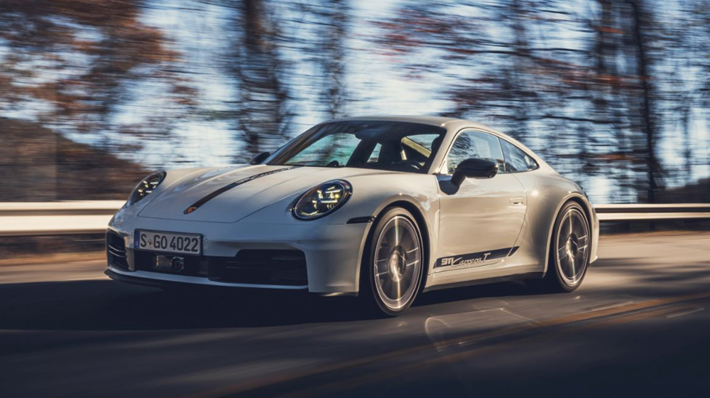 Porsche 911 driving on road