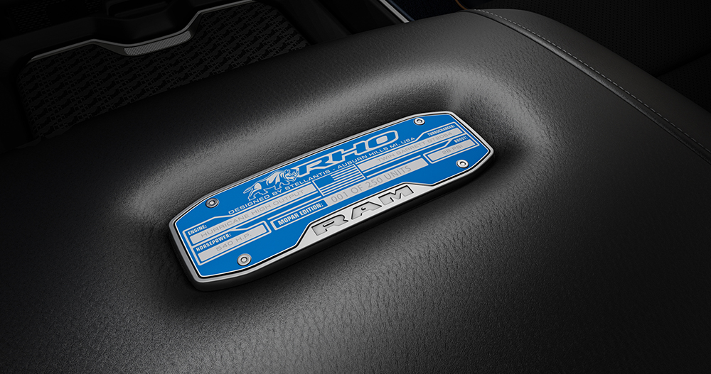 A custom Mopar Blue serialized badge is affixed to the lockable center console in the Mopar '25 Ram 1500 RHO.